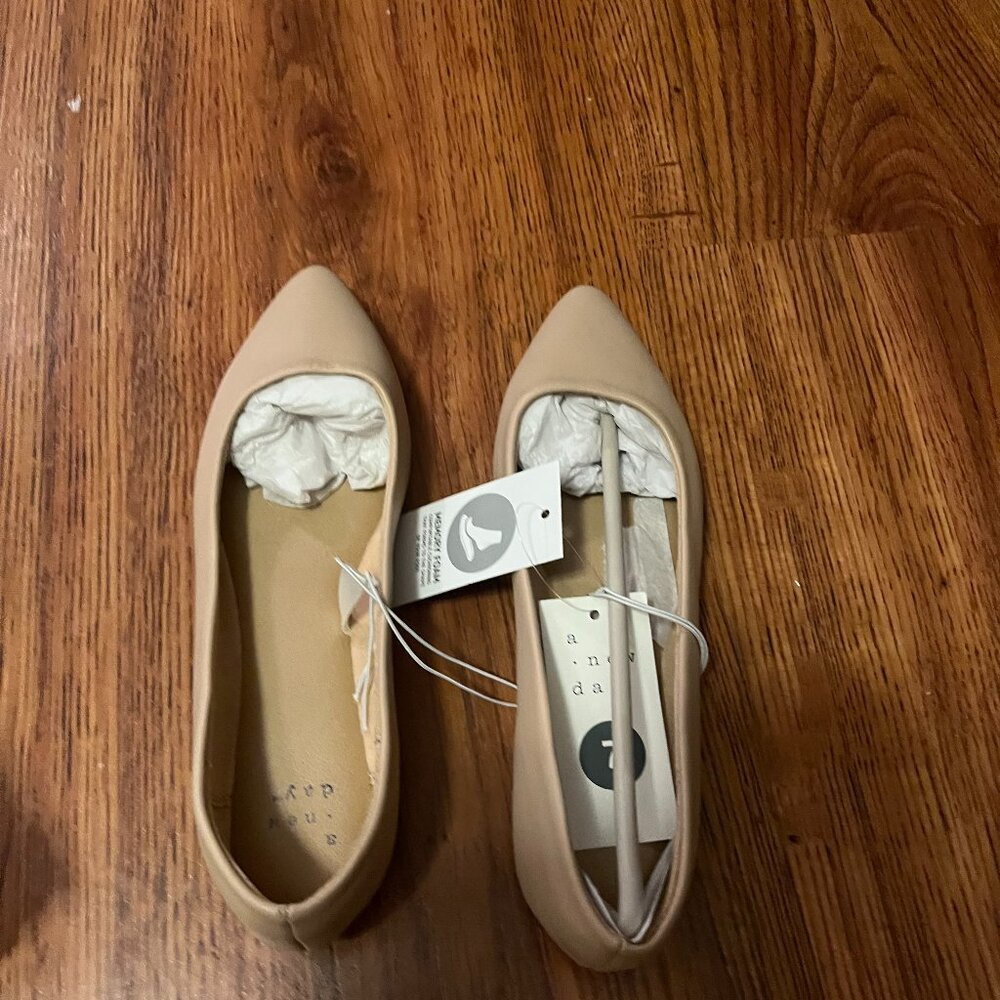 A New Day Flats